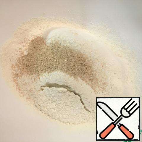 Mix dry ingredients: flour, sugar, salt, yeast.