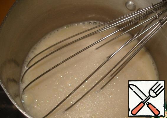 Beat egg with sugar, vanilla sugar, pour milk. Put on a small fire, whisking constantly whisk to bring to a boil.