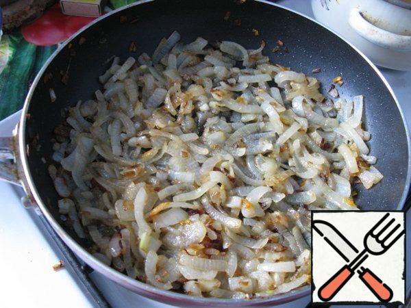 Fry the onion until golden brown.