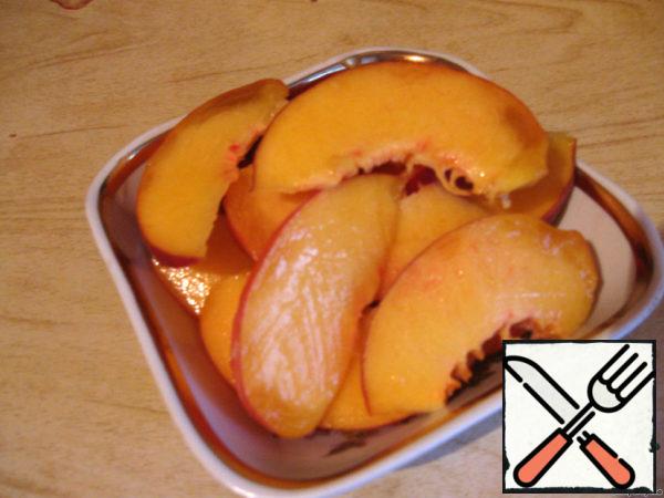 Peach cut into slices.