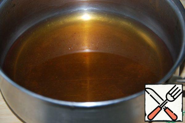 Take a convenient pot and strain it through a sieve ready tea.