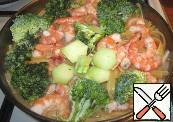 Then put broccoli and shrimp. Cover and cook for 5-7 minutes.