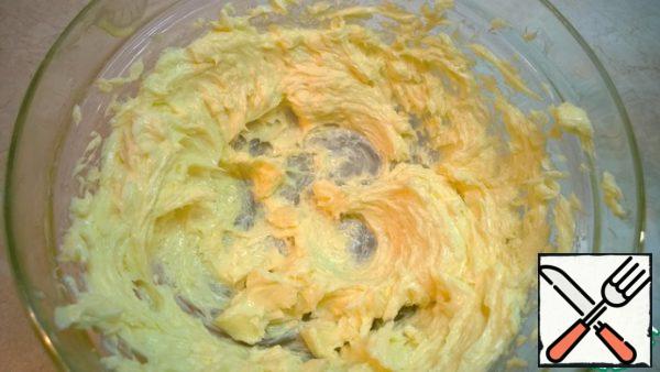 Butter (room temperature) beat with a mixer, add sugar and continue to beat until fluffy.