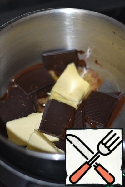 Melt the chocolate and butter in a water bath.