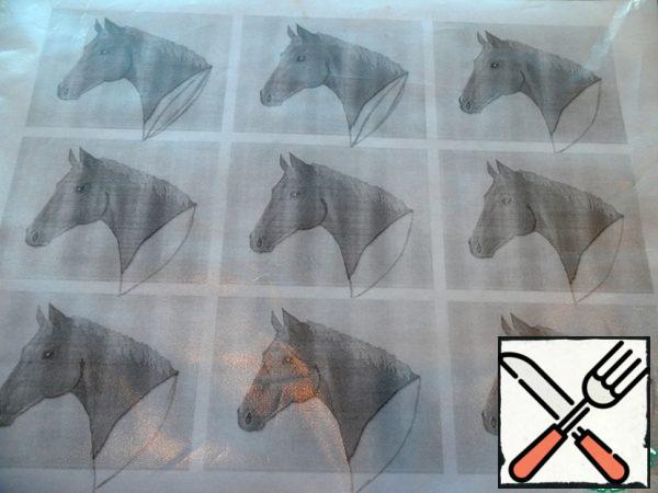 Find an image of a horse's head on the Internet and print 9 drawings on a sheet on a printer. Attach the picture to the paper file. Melted chocolate is applied by applying the contours of our horses.
