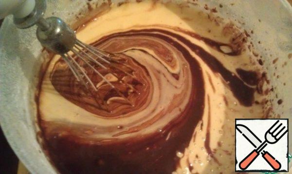 Add the chocolate mass to the dough.