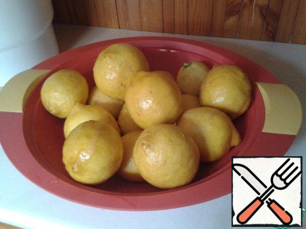 Wash and peel the lemons.
