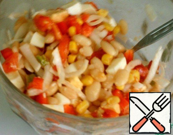 Mix beans, corn, vegetables and eggs.