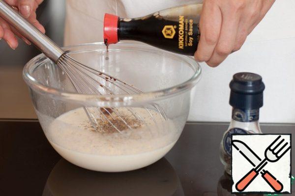 Since the soft cheese is quite bland, add spices with soy sauce and black pepper to it.
