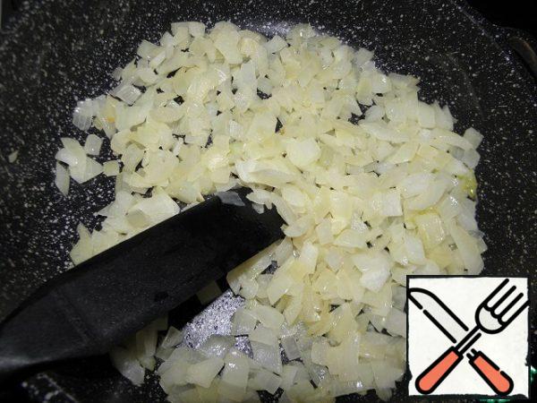 Finely chop the onion and stew in a little butter.
