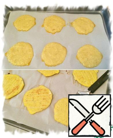 Preheat oven to 190 * C (375*F) and cover baking sheet with parchment. Put the dough on paper in small circles (6 pieces). Put in the oven for 10 minutes. After 10 minutes, remove and flip. Send back to the oven for another 5-7 minutes.