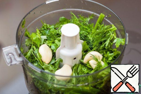 Transfer to food processor, add salt and peeled garlic.