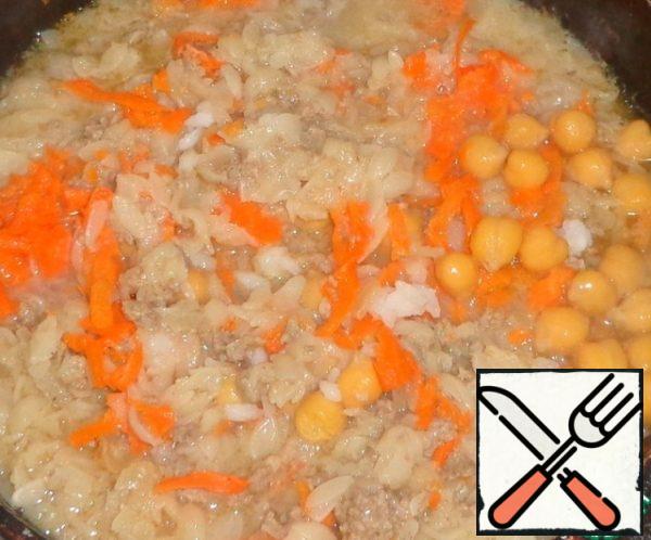Add boiled chickpeas. Mix it.