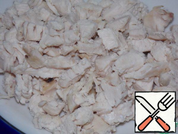 Finely chop the chicken fillet.
