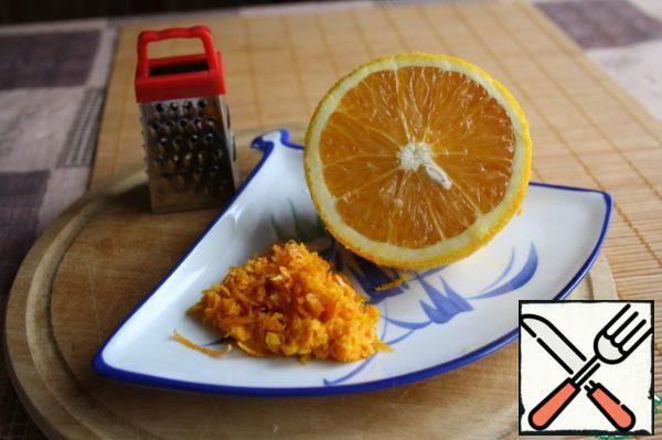 Grate the zest from one large orange.
