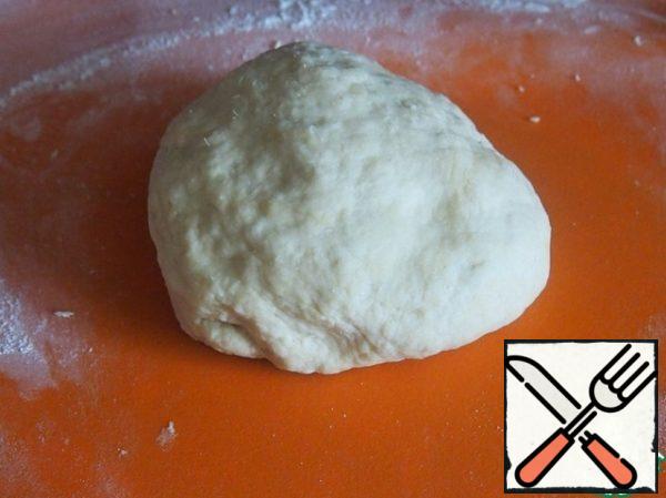 Knead the dough well, wrap in cling film and leave to rest for 30 minutes.