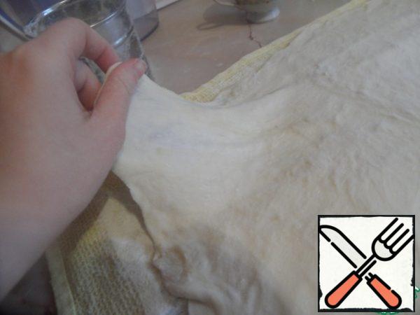 The dough turns out to be very elastic and easily stretches.
