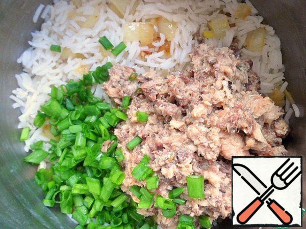 Canned open and chop with a fork. Add green onions and rice, pepper.