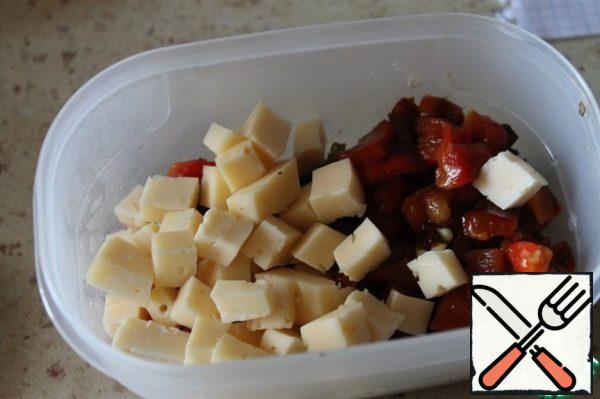 Then cut the cheese into cubes. Mix it.