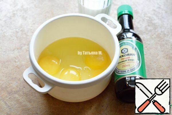 Mix eggs with soy sauce and milk;
