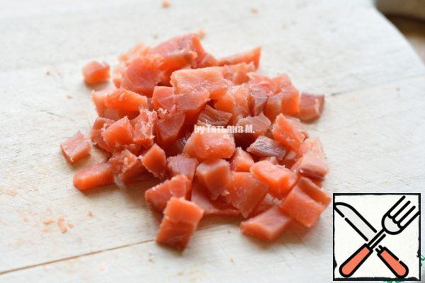 Cut trout into cubes;
