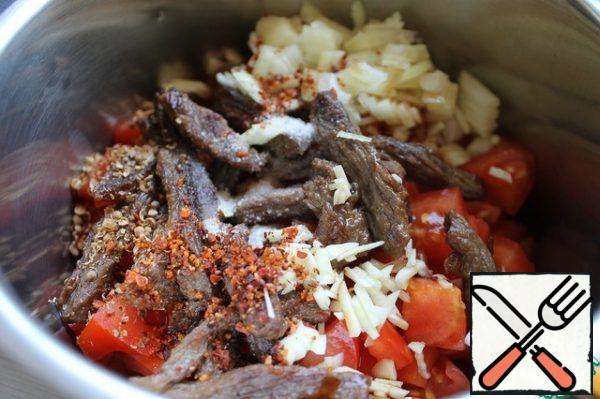 In a container, mix tomatoes, beef, salt, soy sauce, hot pepper, onion (finely chopped), garlic (also finely chopped), ground cilantro. Add the oil in which the meat was fried.
