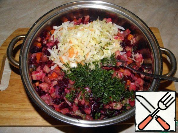 Add sauerkraut and herbs, mix again.
