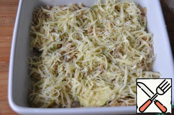Sprinkle with hard grated cheese, in the original Emmental or cheddar.
Put in the oven heated to 190 degrees and bake until the rice is ready and the cheese is Golden for 20 minutes. In the original 40 minutes, for me, is too much.