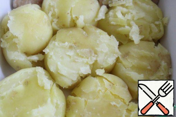 Flatten the potatoes slightly.

