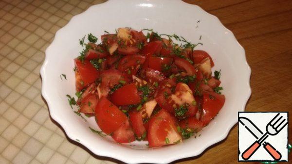 In a separate bowl cut into small pieces of tomato, add dill, a little salt and mix.