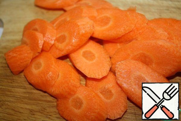 Carrots cut into thin washers.