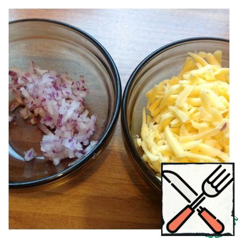 Cheese grate on a large grater, onions cut into very small cubes.