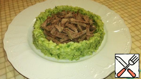 Cut the beef into strips and spread on our green plate.