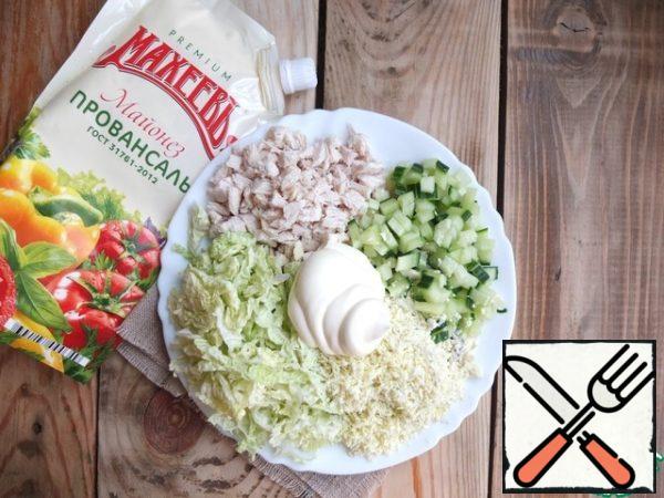 Season the salad with mayonnaise. Add Salt.
Stir.