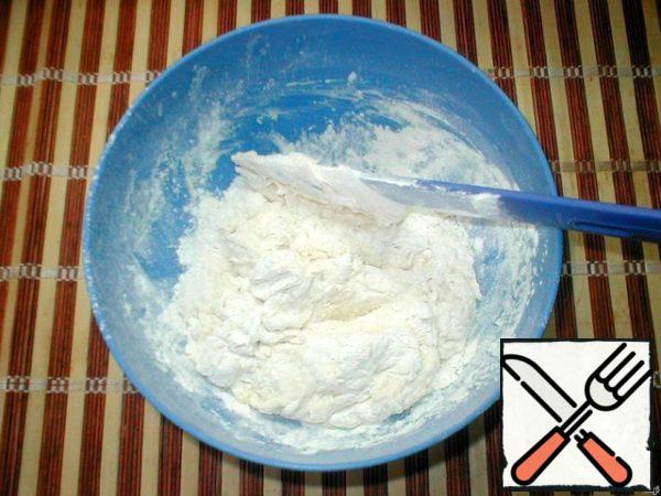 Add the remaining ingredients and knead the dough so that it does not stick to your hands (if necessary, add a little flour). Flour should be sifted through a sieve to enrich it with oxygen.
