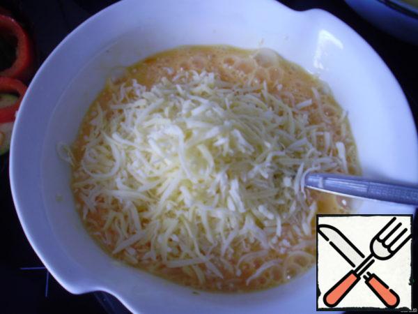 Eggs mix with cheese.