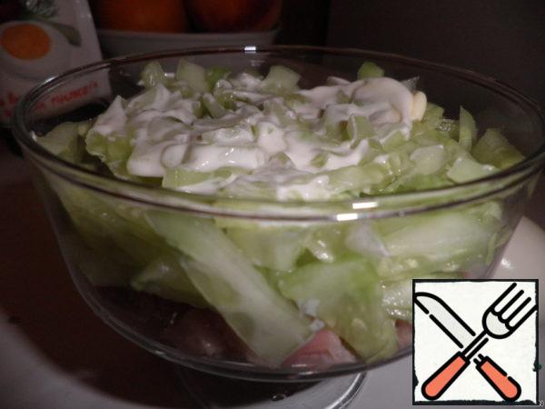 Cucumber is also cut into strips and add to the salad bowl.