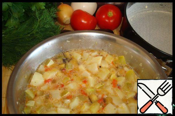 Add potatoes and vegetables. Stir and try for salt. Season with spices to taste.