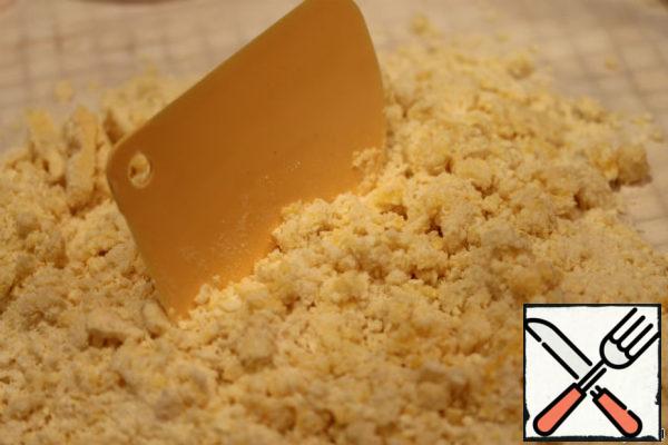 Rub it with your hands or a spatula, or you can use a blender to crumble.
