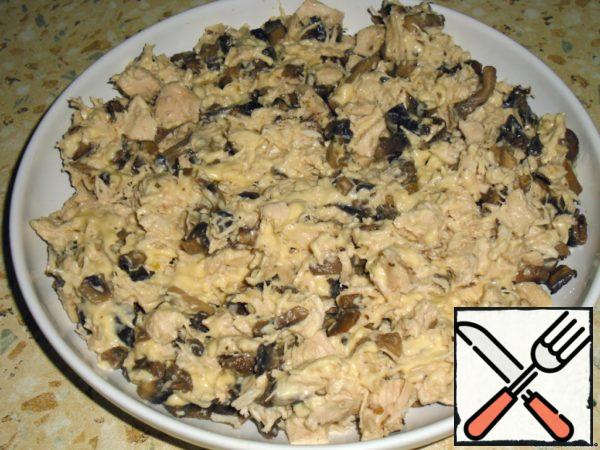 Mix mushrooms, chicken and cream cheese.
