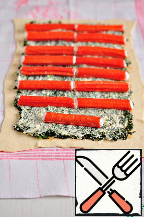 Lay out crab sticks.