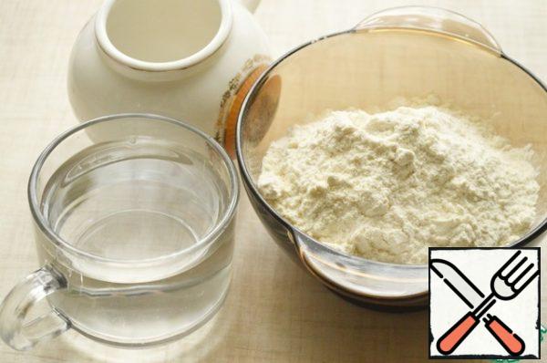 Mix in a Cup of sifted flour and salt. Gradually add butter and flour and knead the dough. If necessary, you can still add 2-3 teaspoons of water.