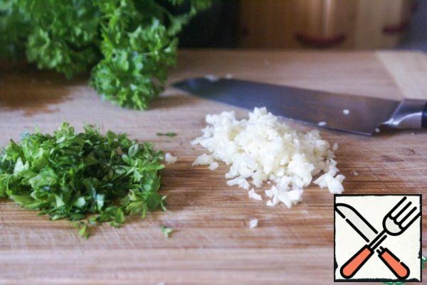 Chop the garlic and herbs.
* I use parsley, green onions, cilantro, lemon Basil and/or mint are also suitable.