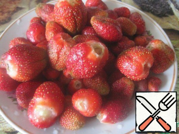 Rub the strawberries through a blender, strain through a fine sieve.

