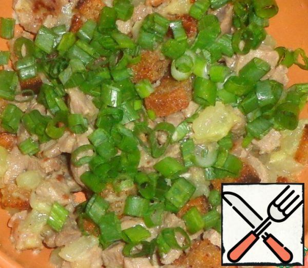Add the green onions.
