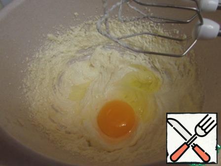 Add the egg, beat well again.