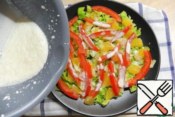 Pour the sauce over the salad.