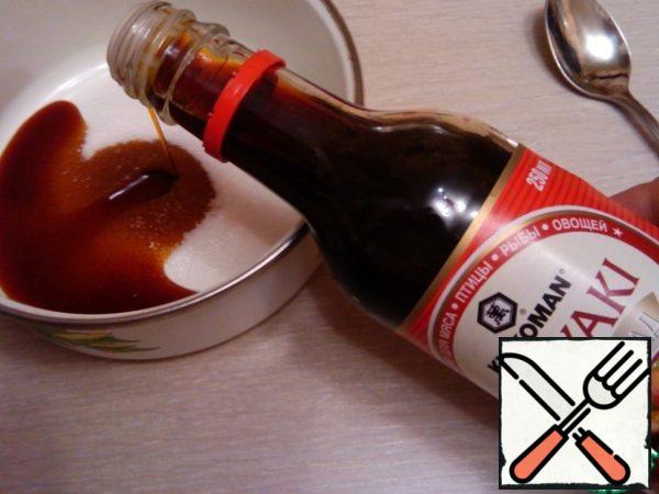 Mix sugar with teriyaki sauce.
