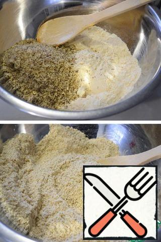 Pour ground nuts and fried flour into a Cup. Stir well.