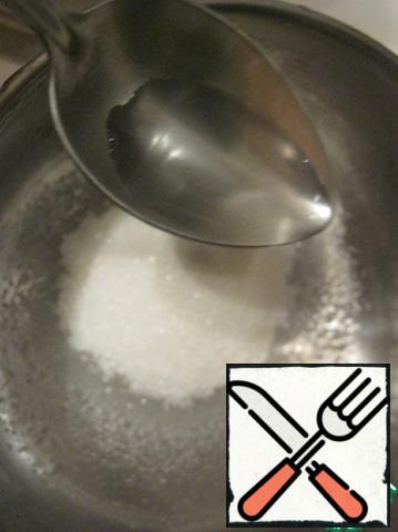 Sugar mix in 3 tbsp water and boil.